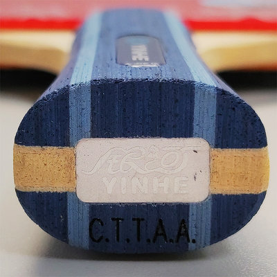 голограмма YINHE на торце ручки